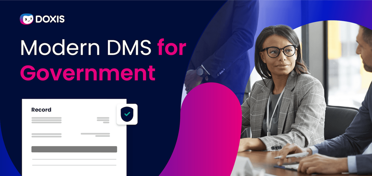 A woman in glasses seated at a conference table, discussing modern document management solutions for government.
