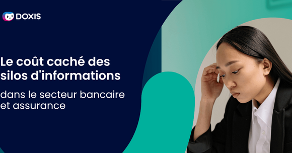Une femme en costume regardant vers le bas, réfléchissant aux silos d'information dans les secteurs bancaire et des assurances.