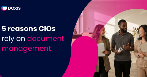 Three professionals discussing document management strategies in an office setting.